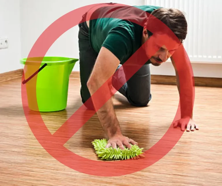 PowerKleen cleaning efficiency graphic showing a person manually scrubbing a floor with a bucket and cloth crossed out by a red prohibition symbol.