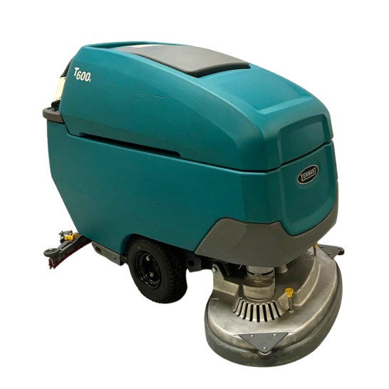 PowerKleen Tennant T600 walk-behind commercial floor scrubber isolated on a white background for industrial cleaning applications.