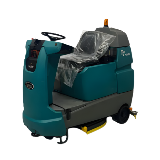 PowerKleen Tennant T7 AMR ride-on floor scrubber isolated on a transparent background for large industrial and commercial floor cleaning operations.