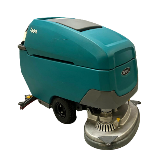 PowerKleen Tennant T600 walk-behind floor scrubber isolated on a transparent background for commercial and industrial floor cleaning applications.